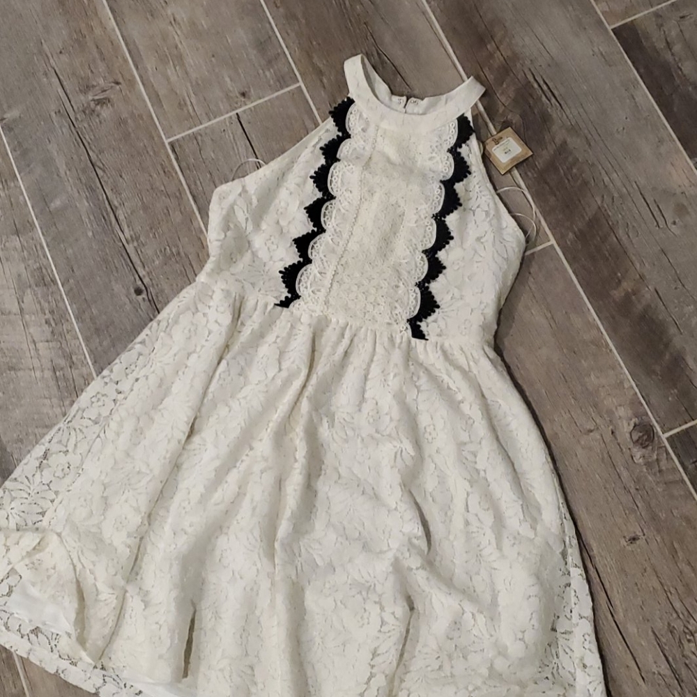 Very cute halter cream and black dress
